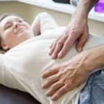 A woman receives a soothing massage, focusing on relaxation and wellness in a spa environment.